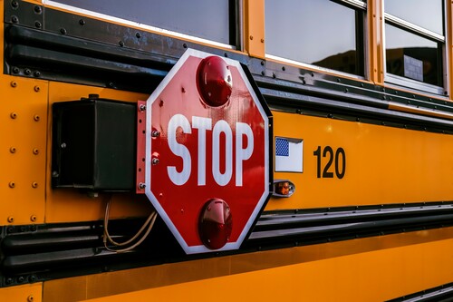 A bus and a stop sign