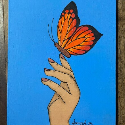 Acrylic painting of a hand with a butterfly on the tip of the index finger