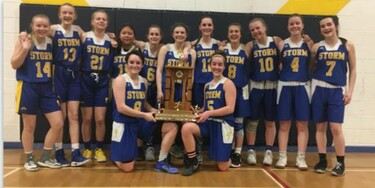 Selkirk Secondary Senior Girls Basketball Team holding trophy for first place in Kootenay Zones tournament.